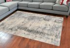 9' X 13' Ivory Blue Machine Woven Abstract Indoor Area Rug