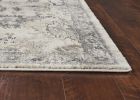 9' X 13' Ivory Machine Woven Distressed Floral Traditional Area Rug