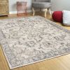 9' X 13' Ivory Machine Woven Distressed Floral Traditional Area Rug