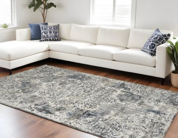 9' X 13' Ivory Machine Woven Distressed Diamond Floral Medallion Area Rug