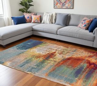 10' X 13' Blue Rust Orange Machine Woven Abstract Brushstrokes Area Rug