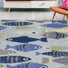 5' X 7' Light Blue School Of Fish Indoor Area Rug