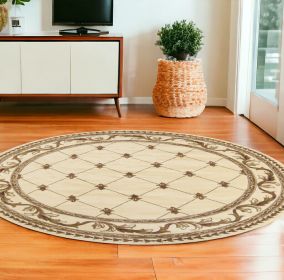 8' Ivory Machine Woven Hand Carved Fleur De Lis Round Indoor Area Rug