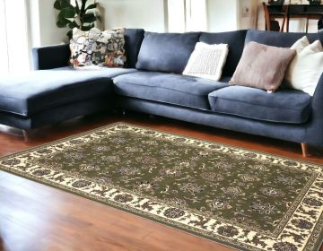 7' X 10'  Polypropylene Green Or  Ivory  Area Rug