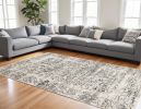 10' X 13' Ivory Grey Machine Woven Distressed Floral Traditional Indoor Area Rug