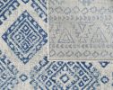 7' X 12' Ivory Blue Machine Woven Distressed Geometric Indoor Area Rug