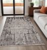 5' X 8' Ivory Grey Machine Woven Abstract Indoor Area Rug