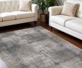 7' X 10' Ivory Grey Machine Woven Abstract Scratch Indoor Area Rug