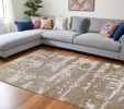 94 X 130 Ivory Or Gold Polypropylene Or Polyester Rug