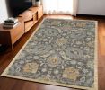 5' X 8' Taupe Machine Woven Traditional Indoor Area Rug