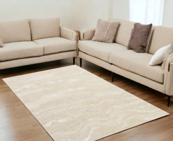 5' X 7' Ivory Hand Tufted Abstract Indoor Area Rug