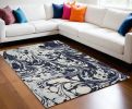 7' X 10' Blue Machine Woven Abstract Indoor Area Rug