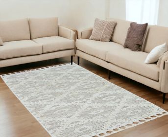 5' X 8' Beige and Ivory Geometric Area Rug