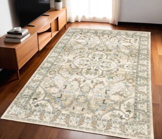 5' X 8' Beige And Ivory Medallion Area Rug