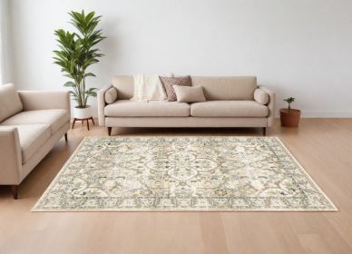 7' X 9' Beige And Ivory Medallion Area Rug