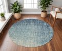 8' Blue and Ivory Abstract Power Loom Round Rug